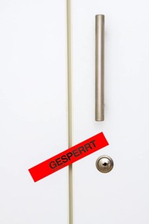 Locked, tape on taped office cupboard door