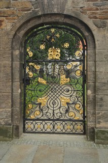 Golden gate with lattice and entrance to the Green Cemetery of St. Mary's Cathedral, wrought iron