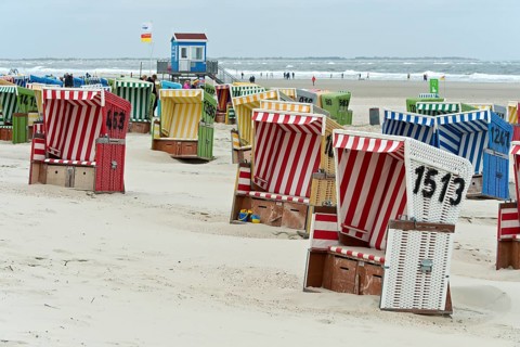 Empty beach chairs on a cool day in the early season on the beach of Langeoog, East Frisian