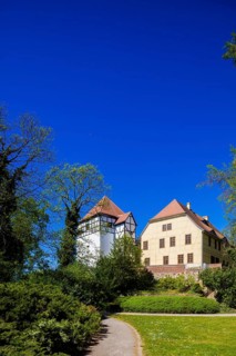 Düben Castle, rises on a small hill to the right of the Mulde River directly on its banks. The