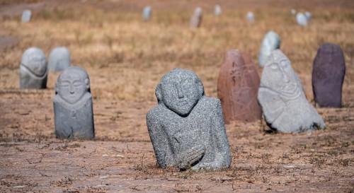Balbals, historical gravestones in the shape of human faces, near Tokmok, Chuy, Kyrgyzstan, Asia