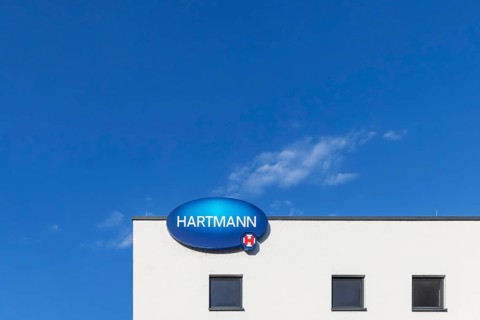 Hartmann Group with company logo on the building, company for medical products and care products,
