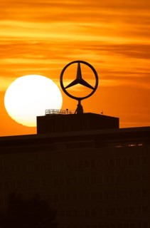 Mercedes star on Mercedes Benz branch in Stuttgart, sunset, Baden-Württemberg, Germany, Europe