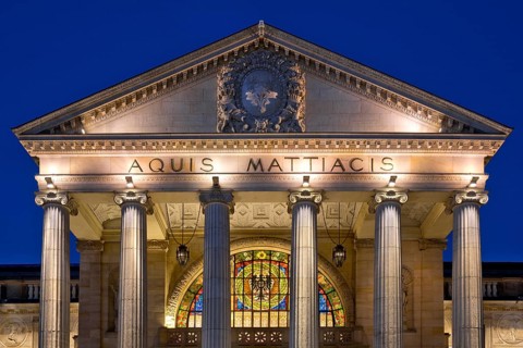 Portico with glass window, illuminated spa hotel and Casino in the evening, Wiesbaden, Hesse,
