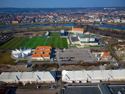 Former Erlwein Slaughterhouse with Osatra Dome and Genussweltern Pavilion