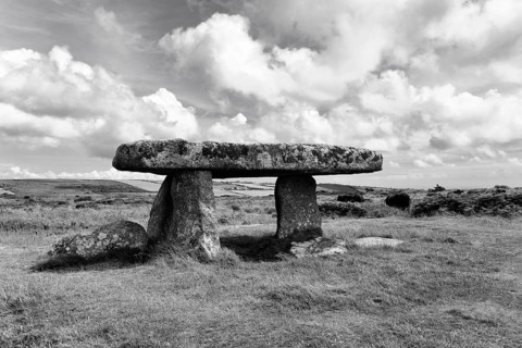 Portal tomb Lanyon Quoit, Neolithic dolmen in a meadow, monochrome, Penzance, Cornwall, England,
