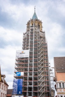 Church tower wrapped in scaffolding, Rottweil, Germany, Europe