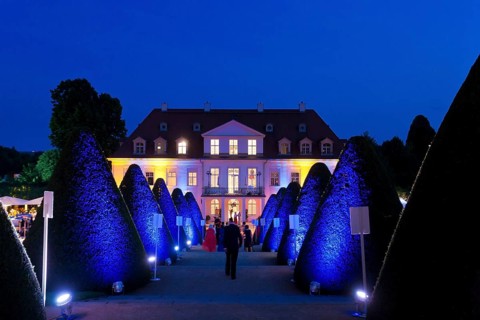 Summer night ball at Wackerbarth Castle. Schloss Wackerbarth or Wackerbarths Ruh' is a baroque
