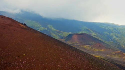 Red-brown small crater, green slopes, red slope, Crateri Silvestri, Etna, volcano, Eastern Sicily,