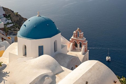 Blue-domed Orthodox Church of Anastasis, Resurrection of Lord, Ia, Oia, Santorini, Thira, Greece,