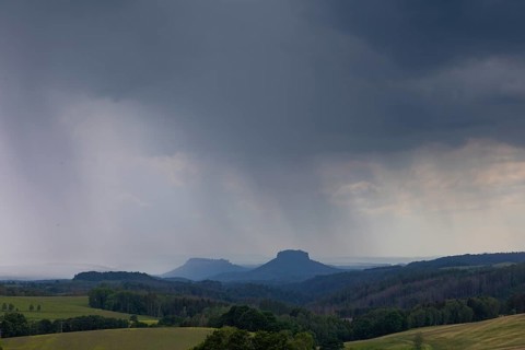 Thunderstorm in Saxon Switzerland seen from the Hochbuschaussicht in the direction of Lilienstein