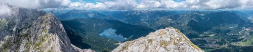 Aerial view, summit cross of the Waxenstein, Eibsee lake and Wetterstein mountains,