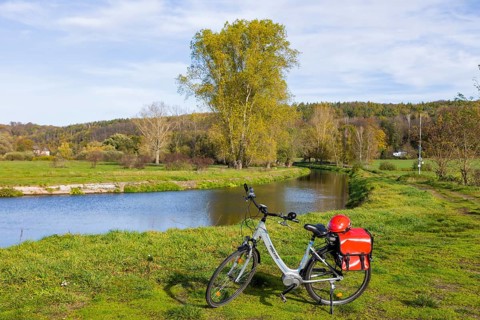 Symbolic image Resting on an e-bike tour in the Leipzig region at the Westewitz weir on the Mulde