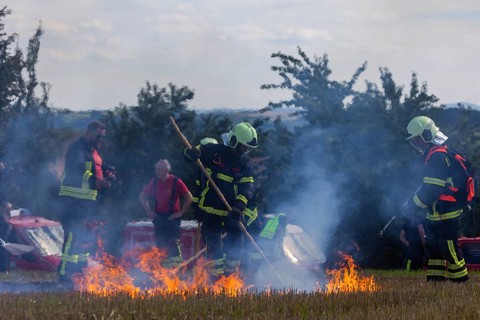 During controlled field fires, the firefighters were able to test various extinguishing methods,