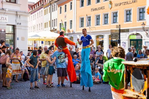 Actors, artists, clowns, fire artists and music bands transformed the city centre into a large