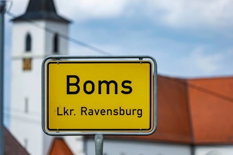 Place-name sign of Boms in the district of Ravensburg with church, Boms, Baden-Württemberg,