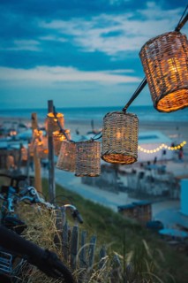 String of lights on the beach at blue hour, Zandvoort, Netherlands