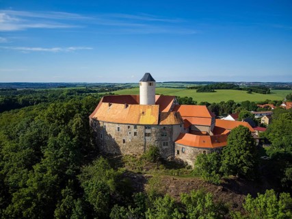 Schönfels Castle with the newly renovated keep (castle tower) . Schönfels Castle is a typical