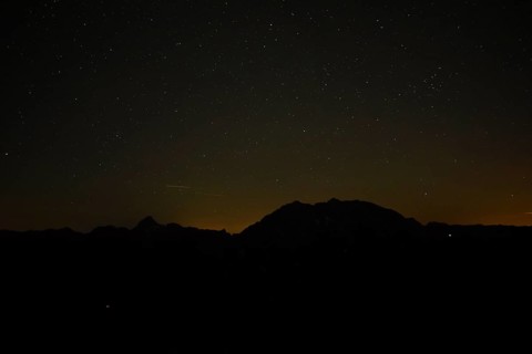 Silhouette of Watzmann and Grosser Hundstod at night in Berchtesgaden National Park, Bavaria,