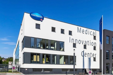 Hartmann Group with company logo on the building, company for medical products and care products,