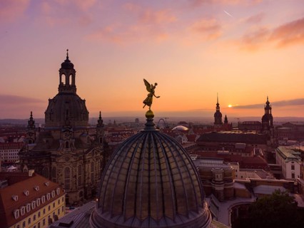 Dresden's old town from above.The glass dome of the Academy of Arts, crowned by a Fama figure,