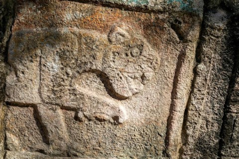 Carved stonework jaguar figure, Chichen Itza, Mayan ruins, Yucatan, Mexico near Temple of the
