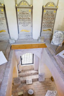 Crypt house with recovered grave slabs at the cemetery in Bad Muskau