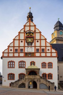 Old town hall with the textile museum. The art clock in the gable was installed by the Hof master