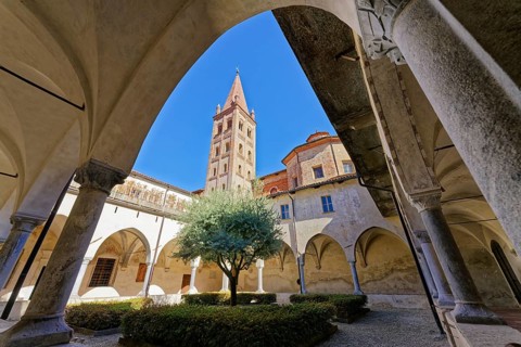 Cloister and church tower, San Giovanni, Saluzzo, Province of Cuneo, Piedmont, Italy, Europe