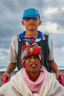 Two dark skinned, sceptical teenagers. San Antao. Cabo Verde. Africa