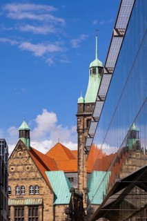 View through Bretgasse to the town hall with the reflection in Galeria Kaufhof