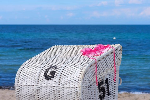 Red bikini drying on a beach chair, Heiligendamm, Mecklenburg-Western Pomerania, Germany, Europe