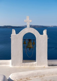 Whitewashed belfry wiith view of caldera and sea, Ia, Oia, Santorini, Greece, Europe