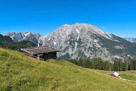 Alpine huts of the Priesbergalm in front of the Watzmann in the Berchtesgaden National Park,