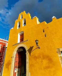 Yellow facade frontage of historic church convent of San Roque, Campeche city, Campeche State,