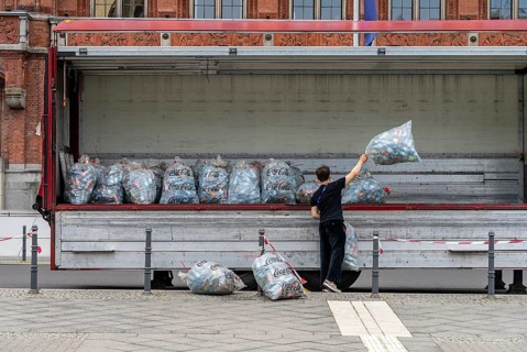 Young people collecting and loading plastic empties, Special Olympics, Berlin, Germany, Europe