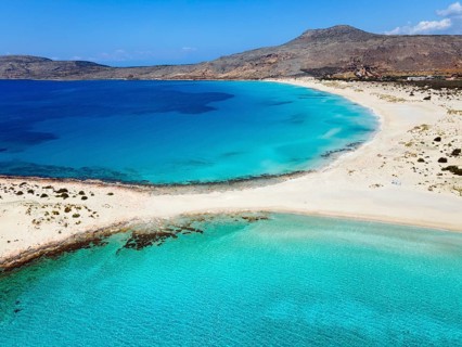 Drone shot, double bay of Simos beach, Sarakiniko beach, Elafonisos, Deer Island, Laconia,