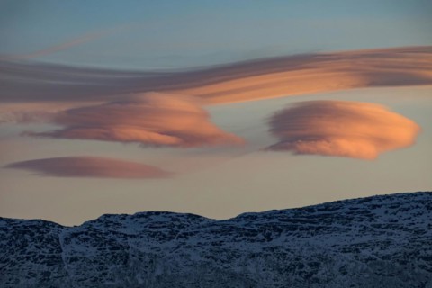 Lenticular clouds, Altocumulus lenticularis in winter in Norway, pink clouds, twilight