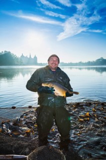 Fishing of the castle pond in Moritzburg