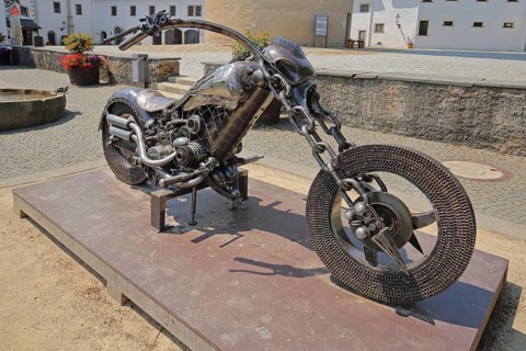 Sculpture Ghost Bike by Chatree Choorachatatorn from scrap metal, motorbike, chopper, front wheel,