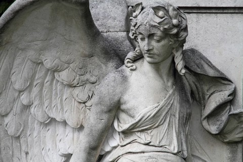 Cemetery mourning statue of a woman