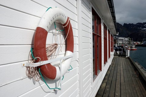 Lifebuoy at the harbour in Henningsvär, Austvagöy, Lofoten, Norway, Europe