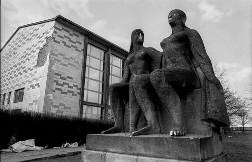 Germany, Berlin, 28 March 1991, Athlete sculpture in front of a building on the grounds of the