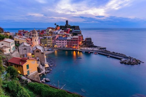 Sunset view of Vernazza, one of the five Mediterranean villages in Cinque Terre, Italy, famous for