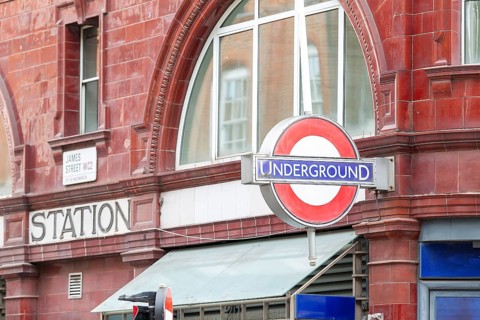 Entrance area of a London Underground station with red brick, London, United Kingdom Great Britain