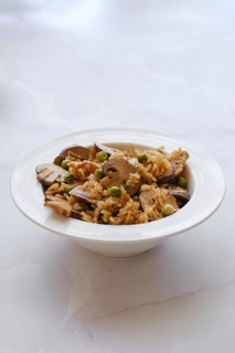 Rice with pork and champignon mushrooms