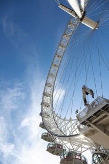 London Eye Ferris wheel under a sunny sky, impressive modern construction, London, United Kingdom