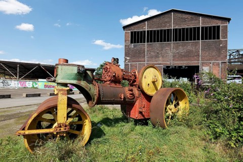 Historic steam roller on the site of the former steelworks, Landschaftspark Duisburg-Nord,