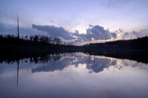 Mountain subsidence area, in winter, at sunset, with reflection, Bottrop, Ruhr area, North