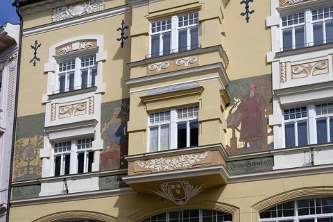 Historic building with elaborate façade paintings and decorative stucco elements, Leonhaus,